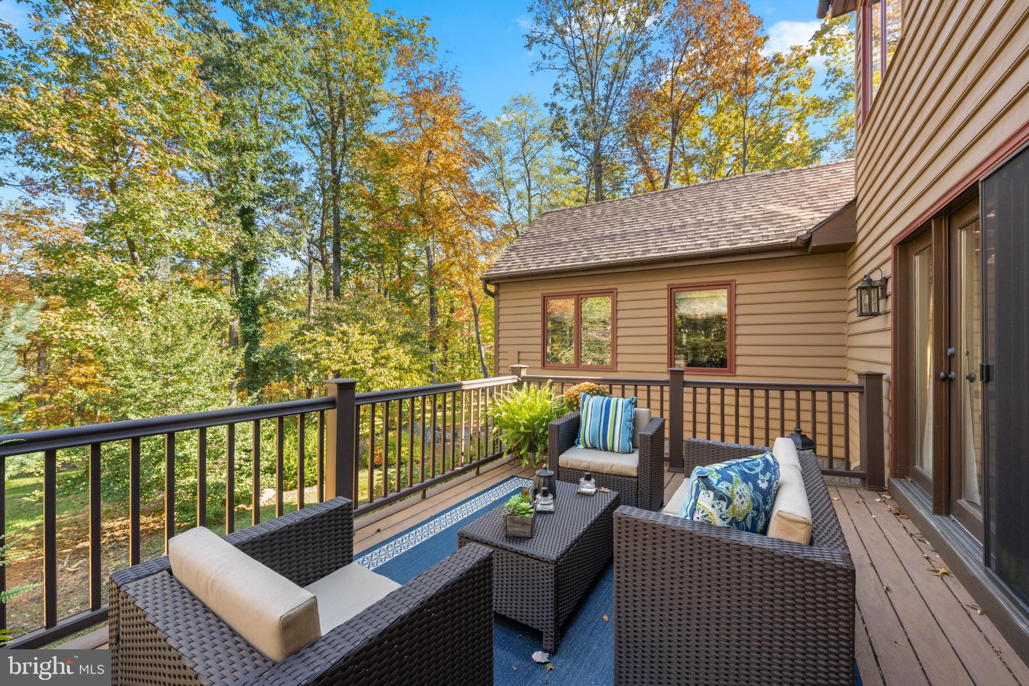 1623 Hilltop Road Spring City, PA 19475 - Photo 18 of 70 Serene deck surrounded by autumn foliage.