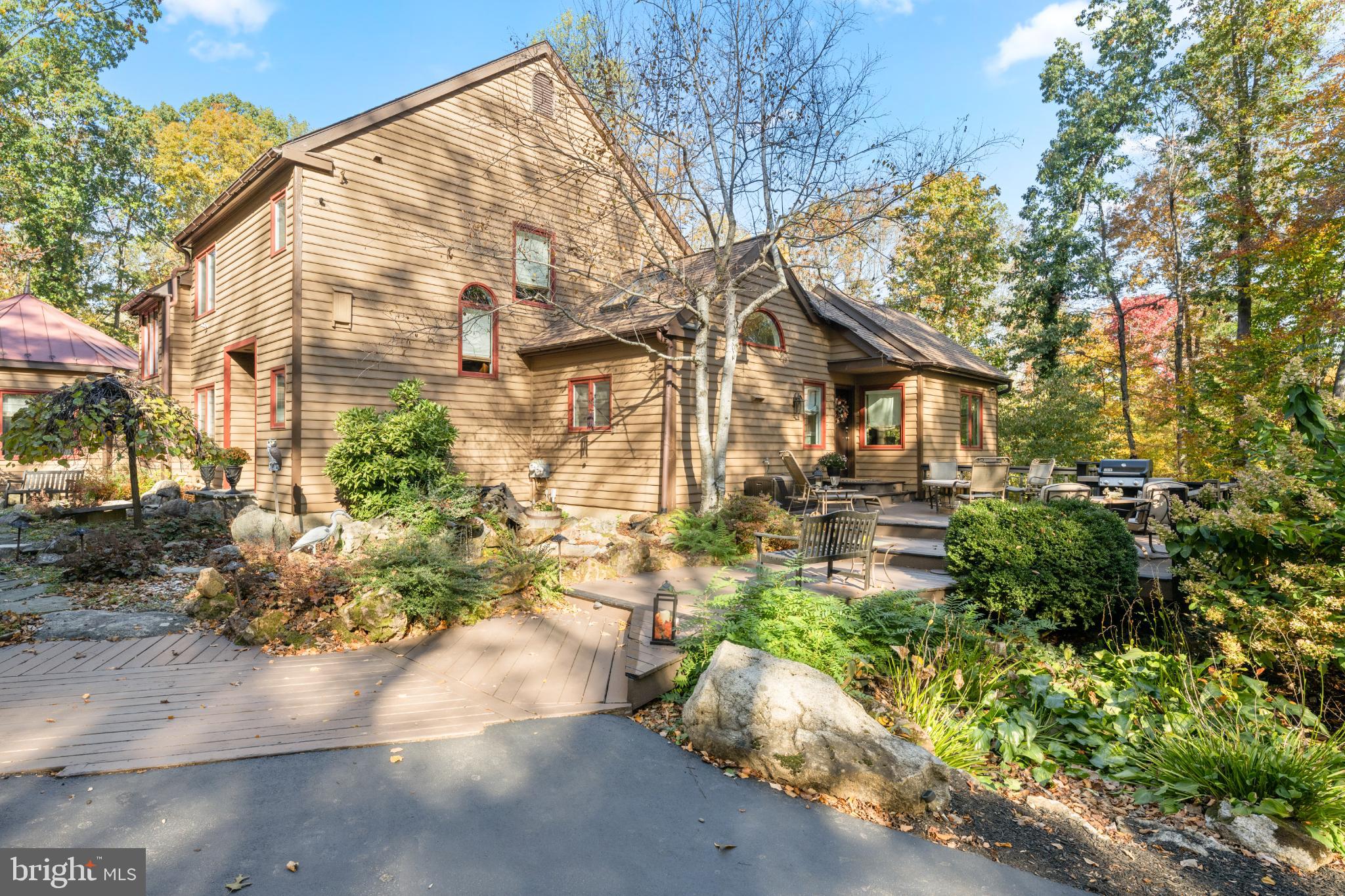 1623 Hilltop Road Spring City, PA 19475 - Photo 2 of 70 Charming home nestled in vibrant foliage.