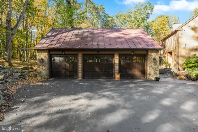 a living room with furniture or couch and a large window