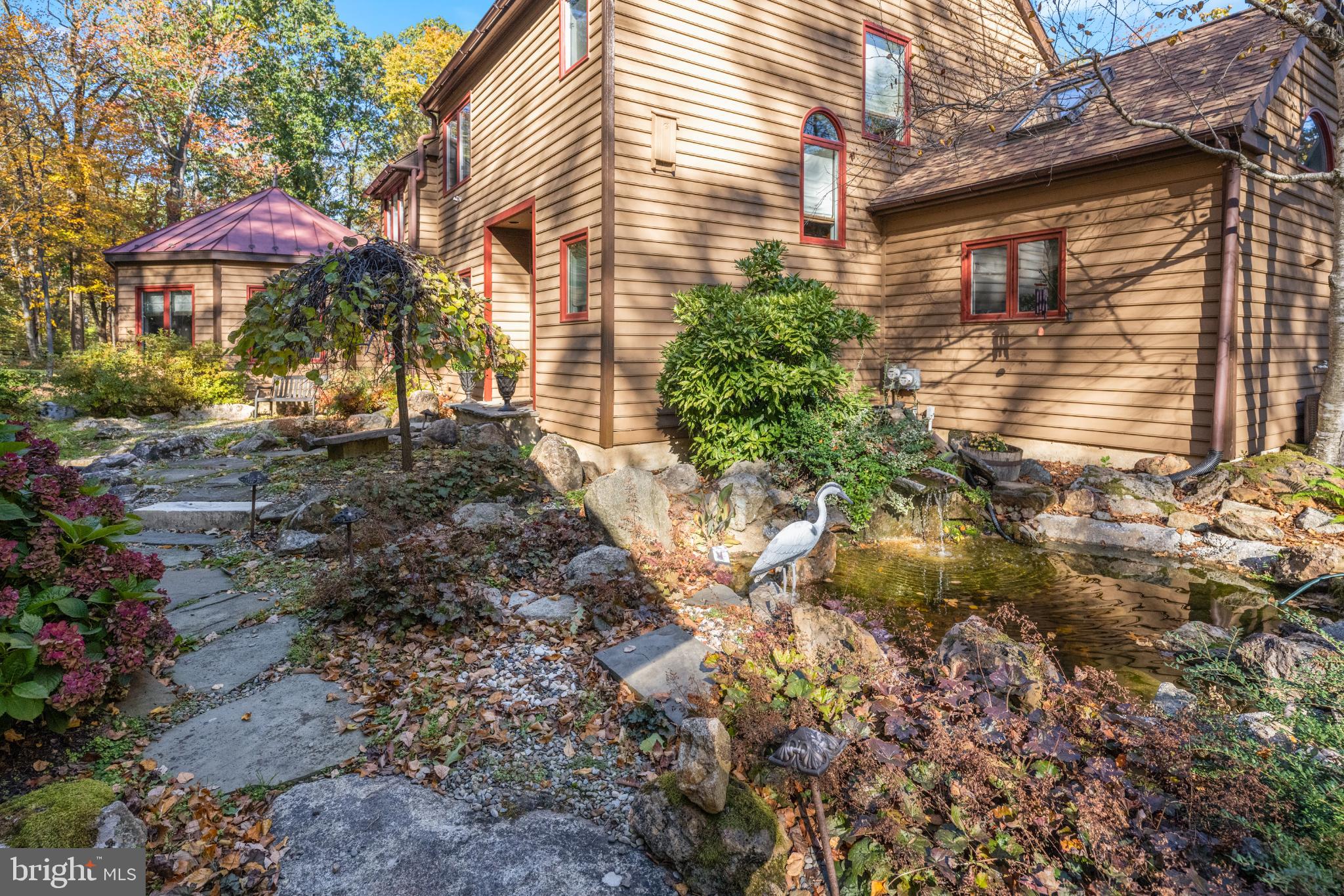 1623 Hilltop Road Spring City, PA 19475 - Photo 23 of 70 Serene garden oasis by a charming home.