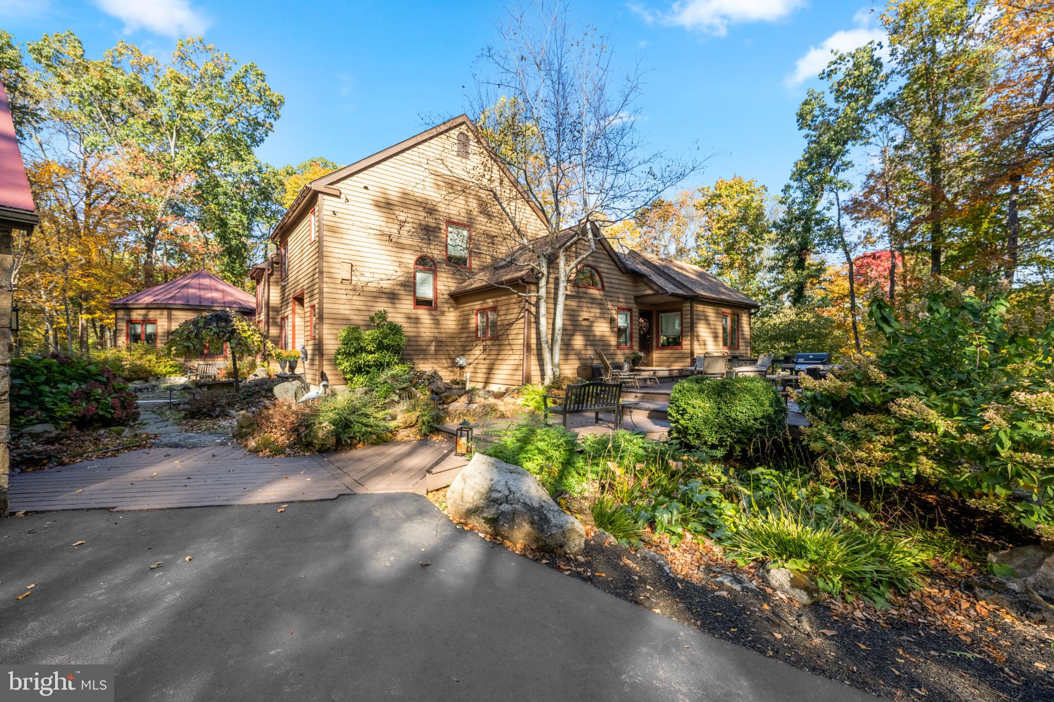 1623 Hilltop Road Spring City, PA 19475 - Photo 24 of 70 Charming home nestled in vibrant autumn foliage.