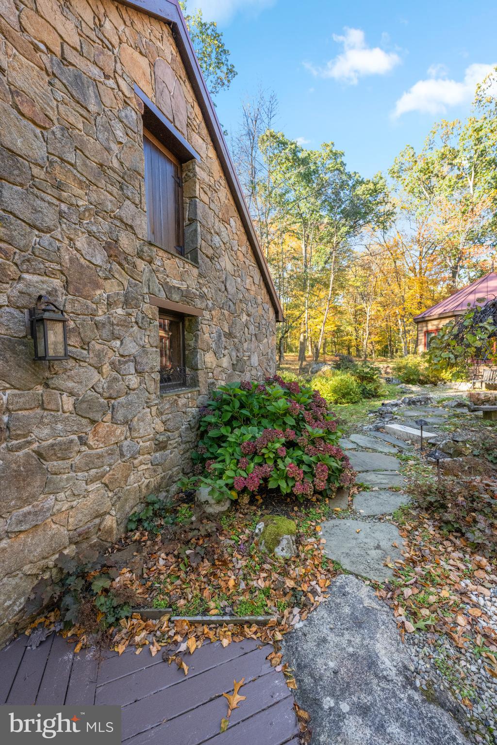 1623 Hilltop Road Spring City, PA 19475 - Photo 25 of 70 Charming stone exterior with lush landscaping.