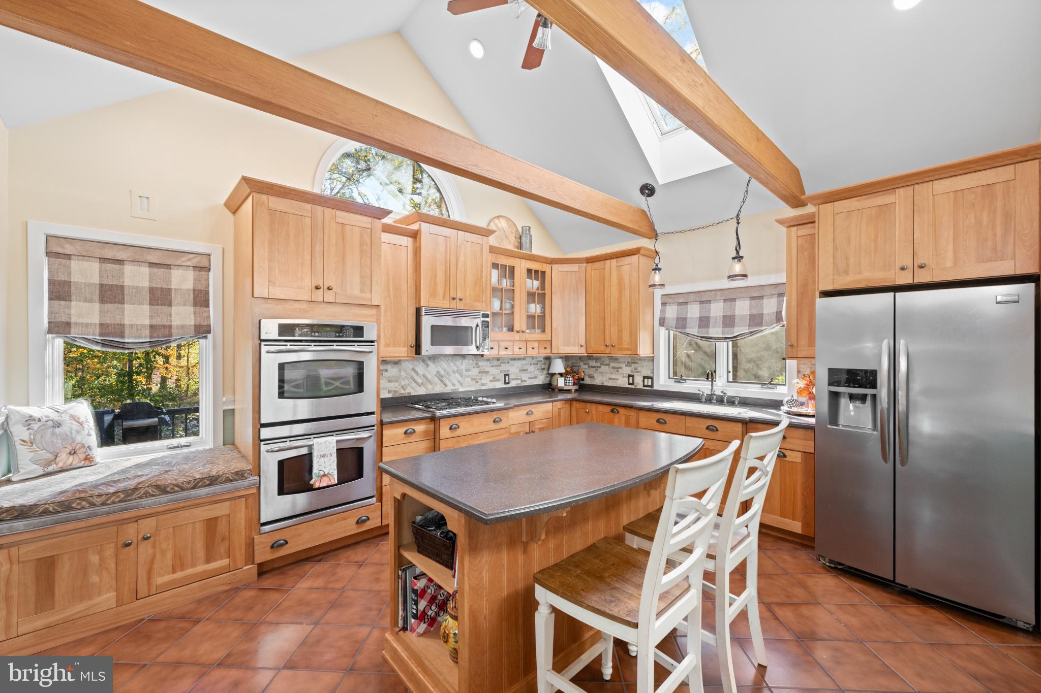 1623 Hilltop Road Spring City, PA 19475 - Photo 42 of 70 Sunlit kitchen with warm wood accents.