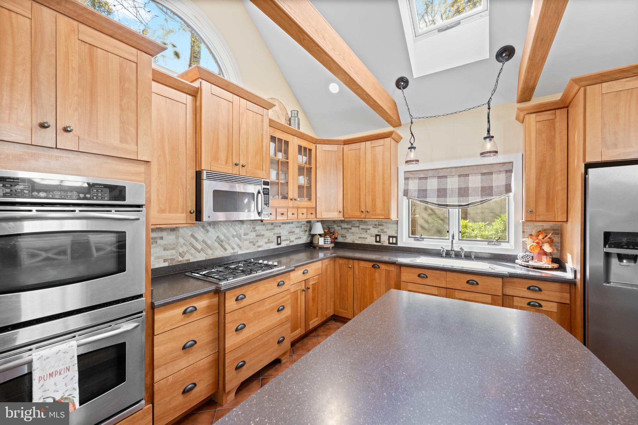 1623 Hilltop Road Spring City, PA 19475 - Photo 43 of 70 Warm wood tones in a sunlit kitchen.