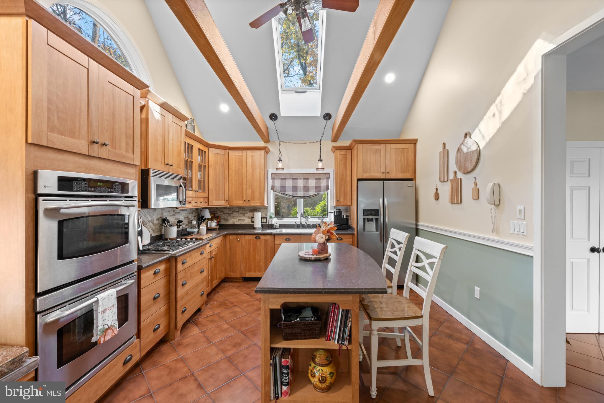 1623 Hilltop Road Spring City, PA 19475 - Photo 44 of 70 Sunlit kitchen with warm wood accents.