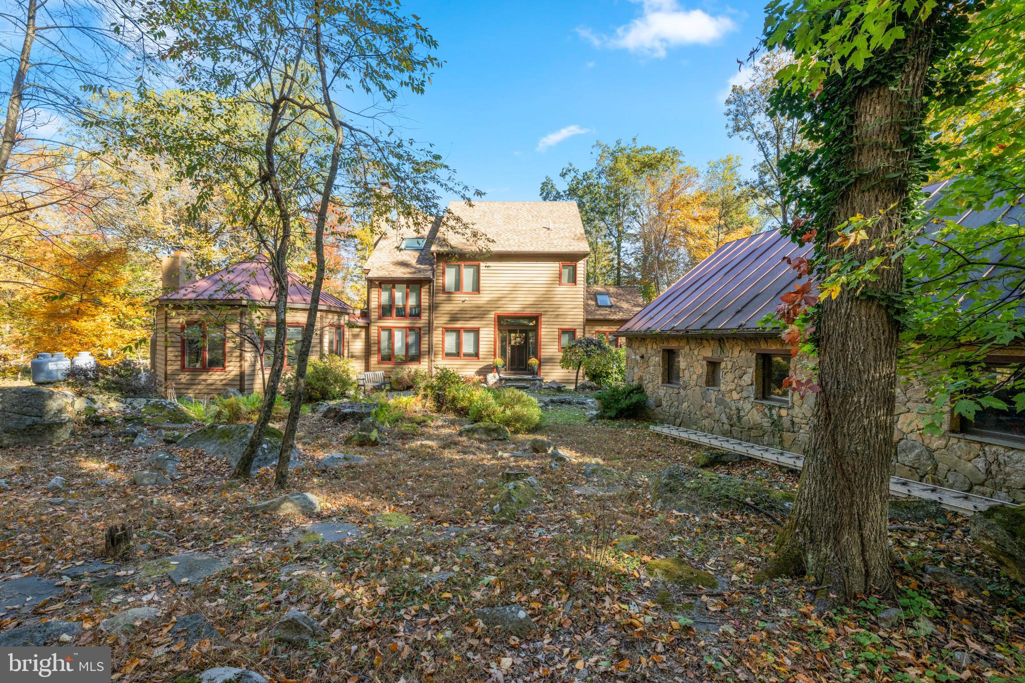 1623 Hilltop Road Spring City, PA 19475 - Photo 6 of 70 Charming retreat amidst vibrant autumn foliage.