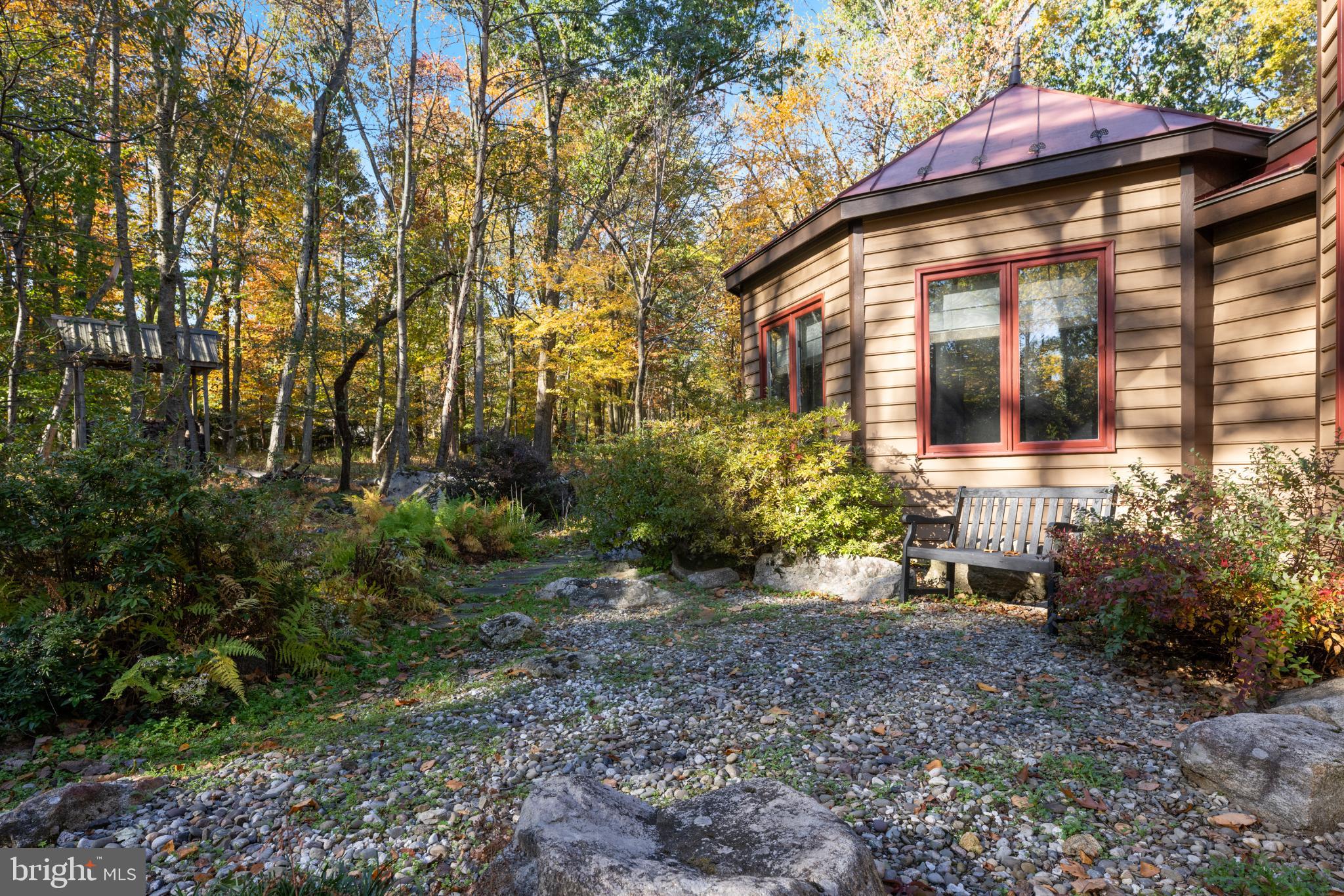1623 Hilltop Road Spring City, PA 19475 - Photo 7 of 70 Serene retreat amid vibrant autumn foliage.