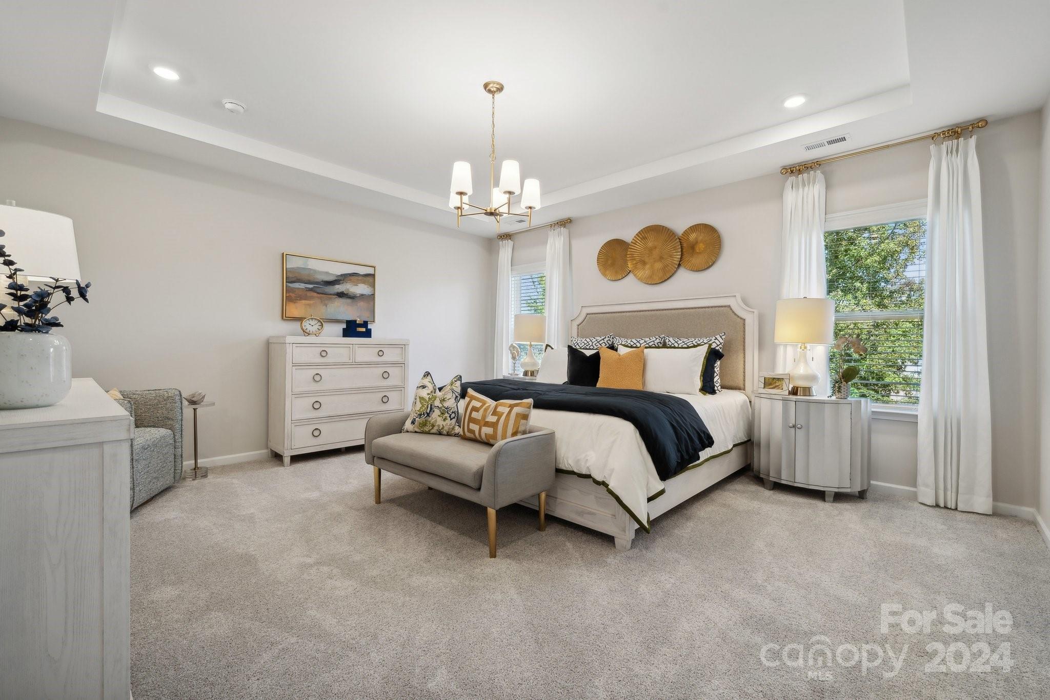 1414 Hubert Graham Way Tega Cay, SC 29708 - Photo 19 of 28 a bedroom with bed and window