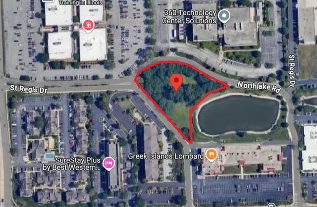 a front view of building with sign board