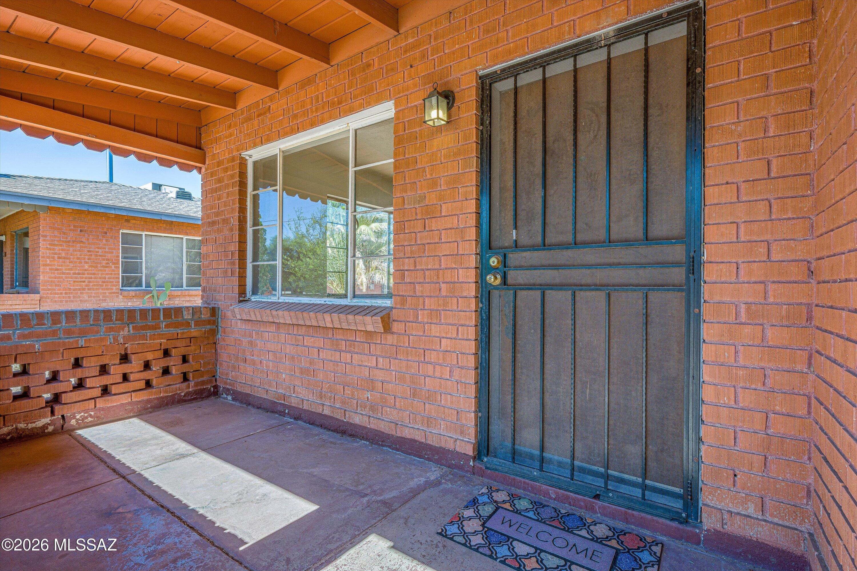 2451 North Richey Boulevard Tucson, AZ 85716 - Photo 2 of 24 Engaging enchantment from curb to porch, inside & out