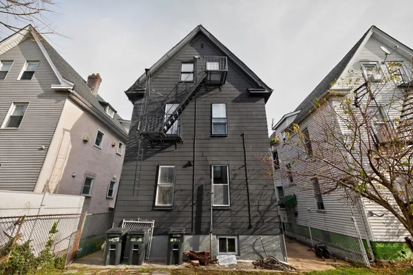 front view of a house with a street