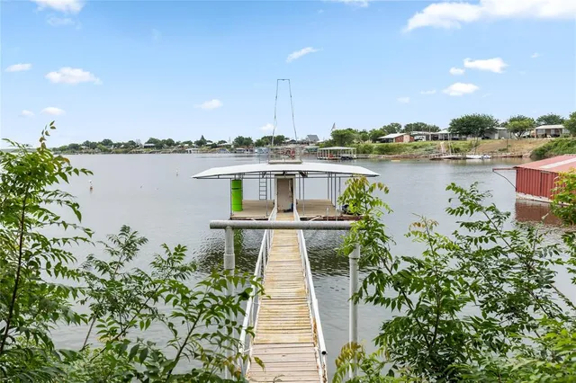 a house with river in front of it