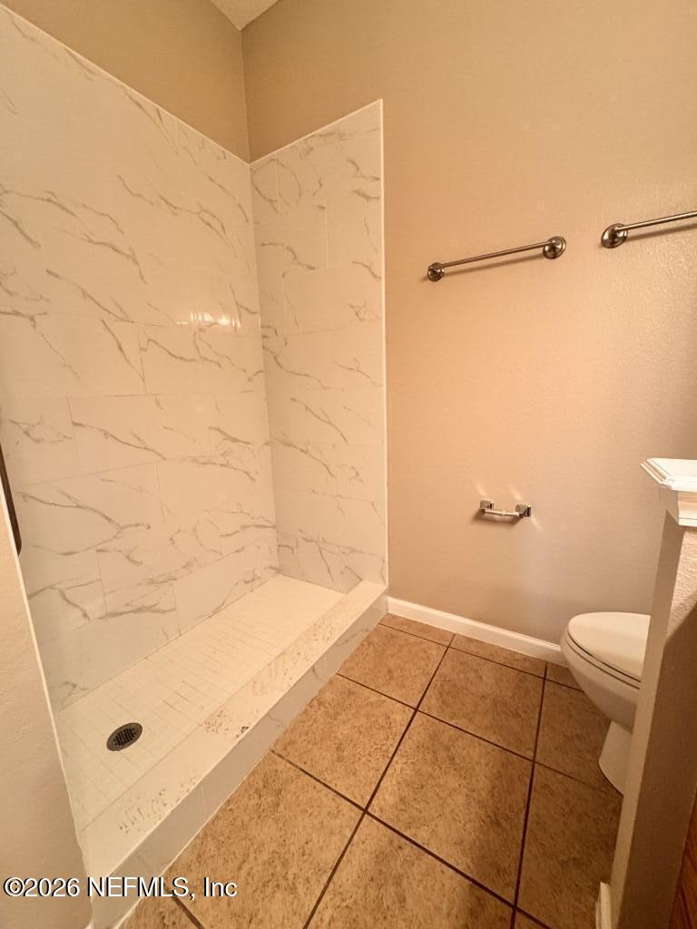 1467 Rivers Road Green Cove Springs, FL 32043 - Photo 17 of 22 a bathroom with a shower