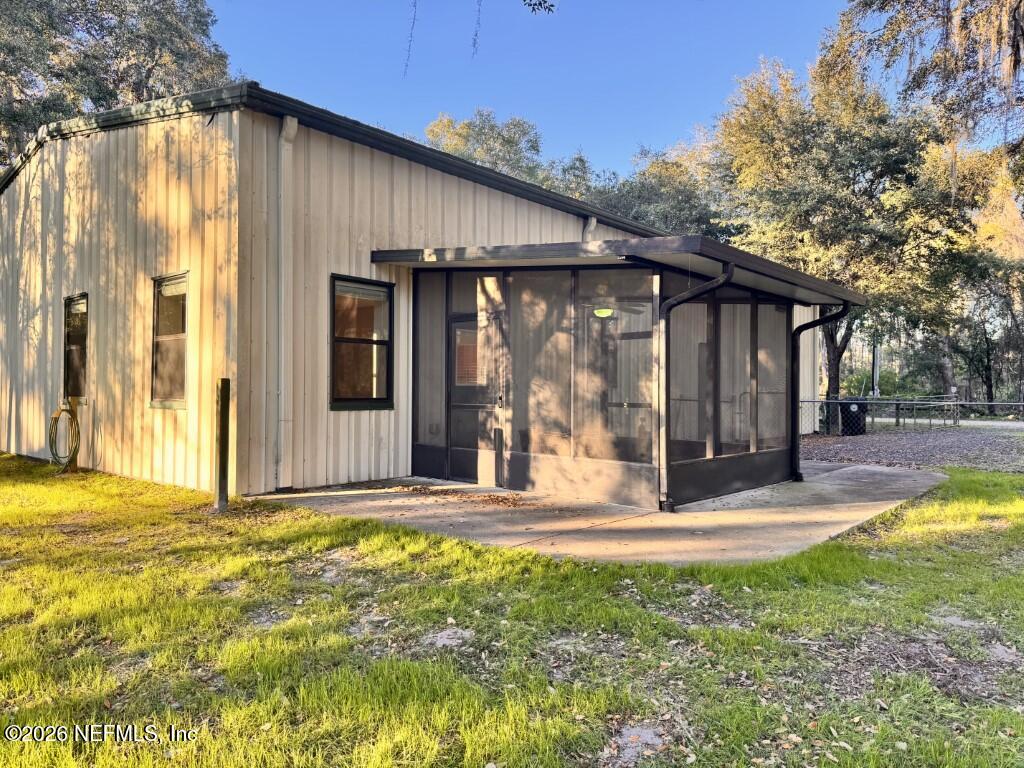 1467 Rivers Road Green Cove Springs, FL 32043 - Photo 3 of 22 a view of a house with backyard and sitting area