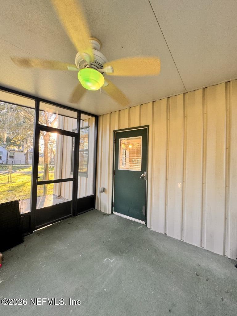1467 Rivers Road Green Cove Springs, FL 32043 - Photo 4 of 22 a view of an empty room with a window