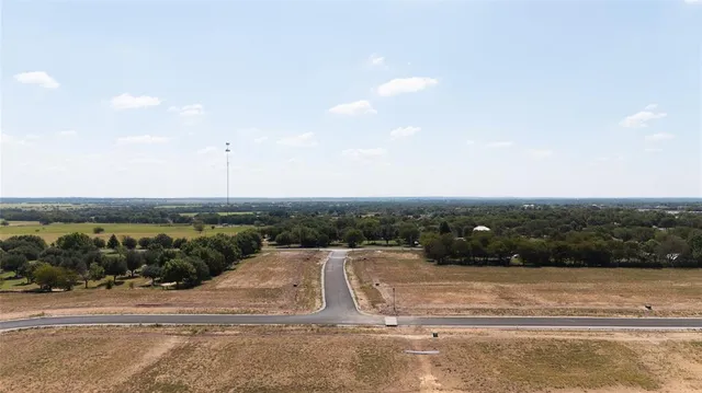 an aerial view of residential building and trees