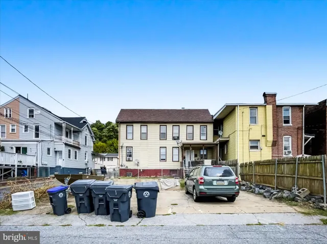 a car parked in front of a building
