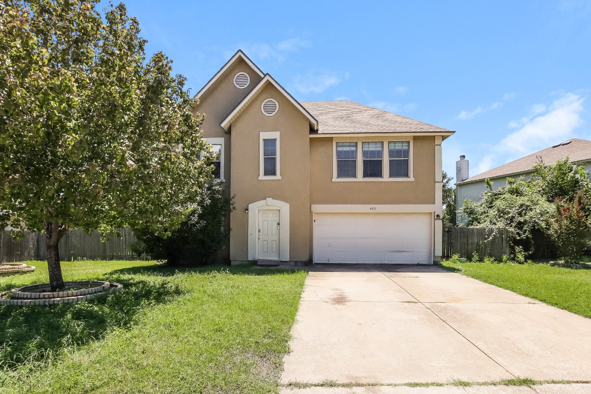 4311 Cisco Valley Drive Round Rock, TX 78664 - Photo 1 of 18 a front view of house with yard