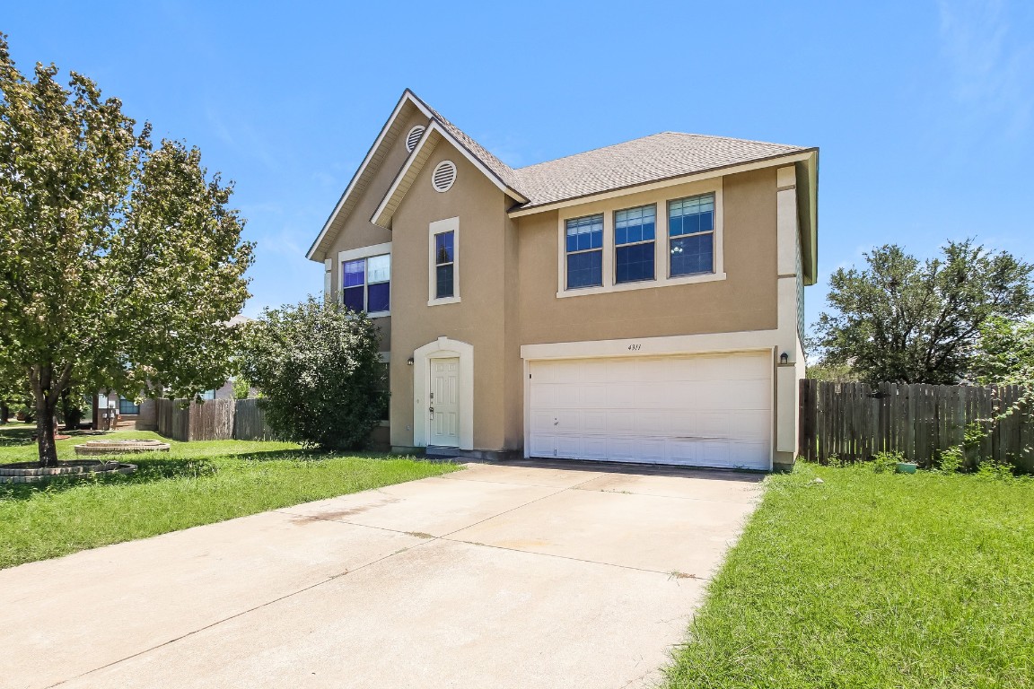 4311 Cisco Valley Drive Round Rock, TX 78664 - Photo 4 of 18 a front view of house with yard and green space