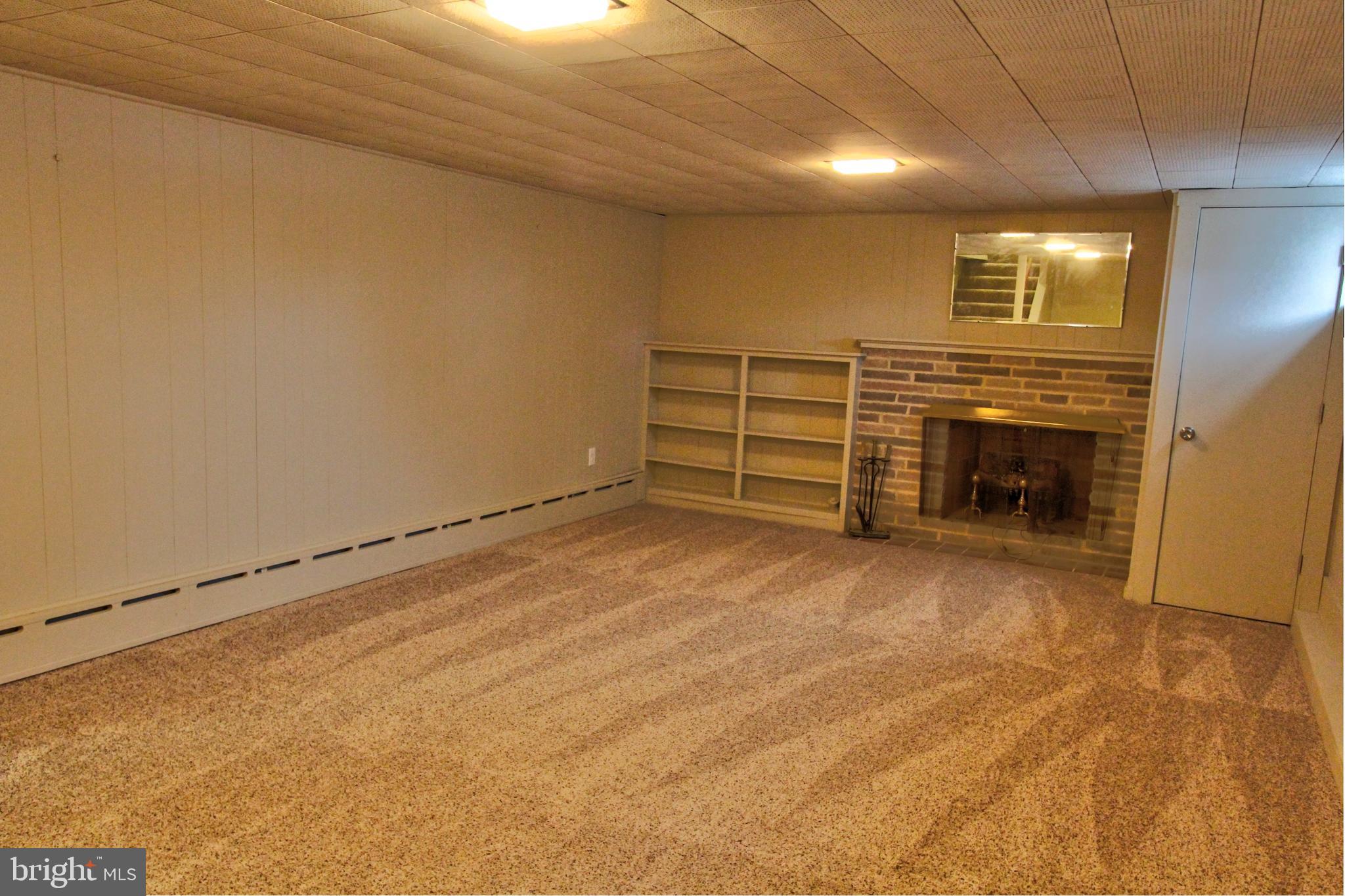 431 Berryhill Road Harrisburg, PA 17109 - Photo 24 of 25 Lower Level Fam Rm with Wood FP & New Windows