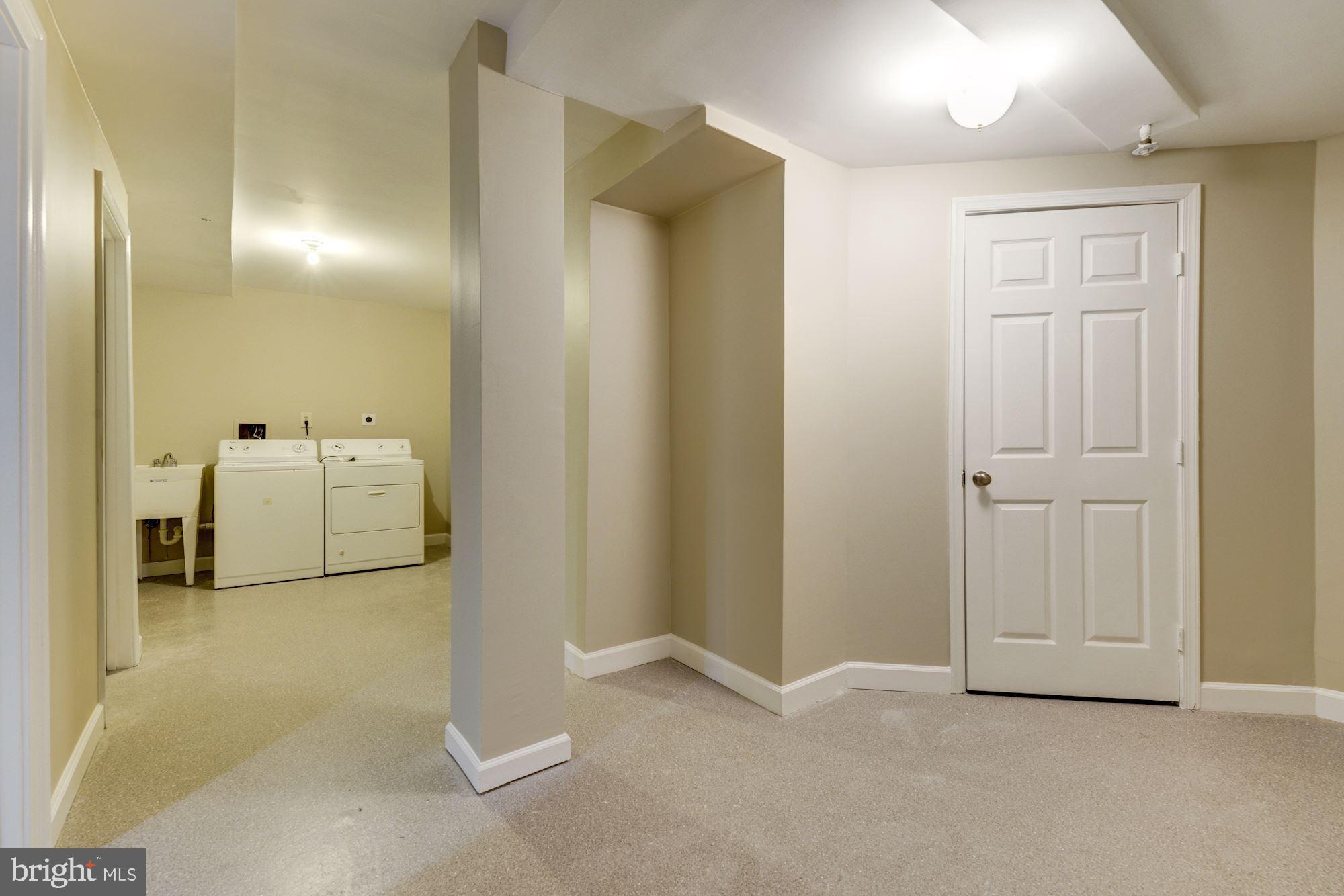 3240 Spriggs Request Way Bowie, MD 20721 - Photo 37 of 41 Basement Laundry and Large Storage Room