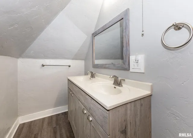 a view of storage and utility room with washer and dryer