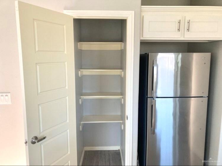 1904 Davenport Street, Unit 4 Weslaco, TX 78596 - Photo 7 of 11 a white refrigerator freezer and a dishwasher