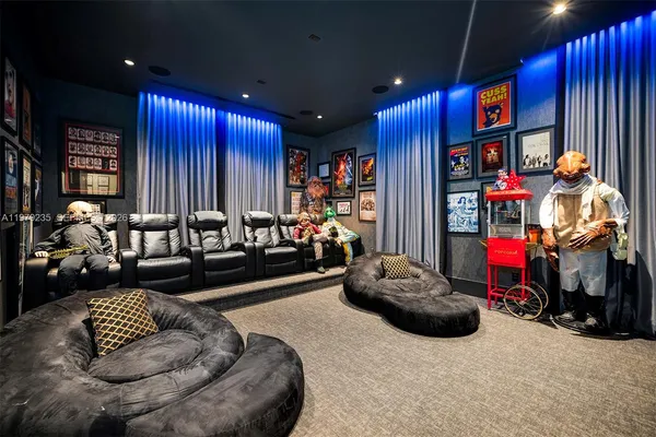 a living room with lots of furniture and toys