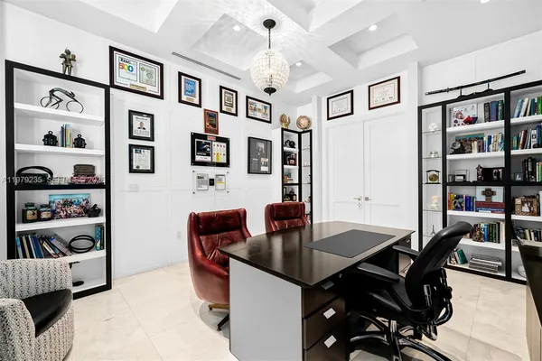 a workspace with furniture and book shelf
