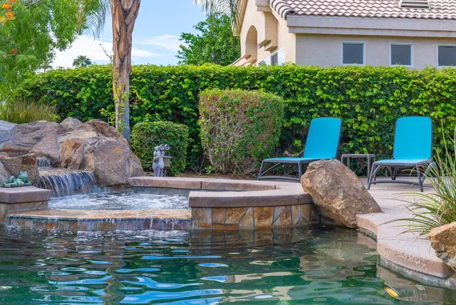 a view of pool with outdoor seating