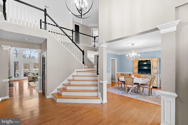 a bathroom with a sink and mirror with toilet