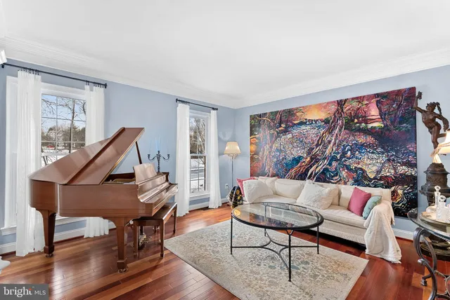 a spacious bedroom with a bed and a couch