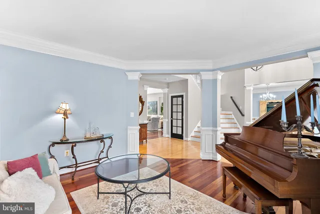 a spacious bathroom with a tub shower and window