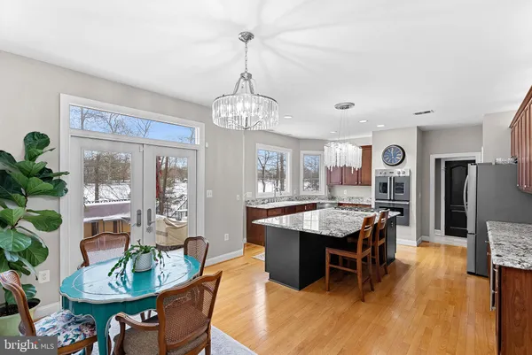 a view of a patio with iron fence