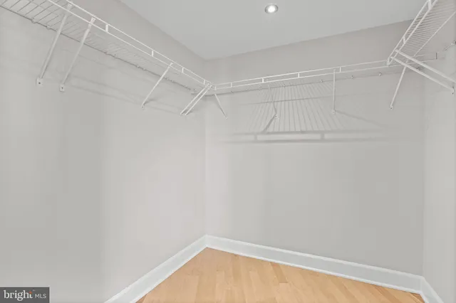 a view of an empty walk in closet