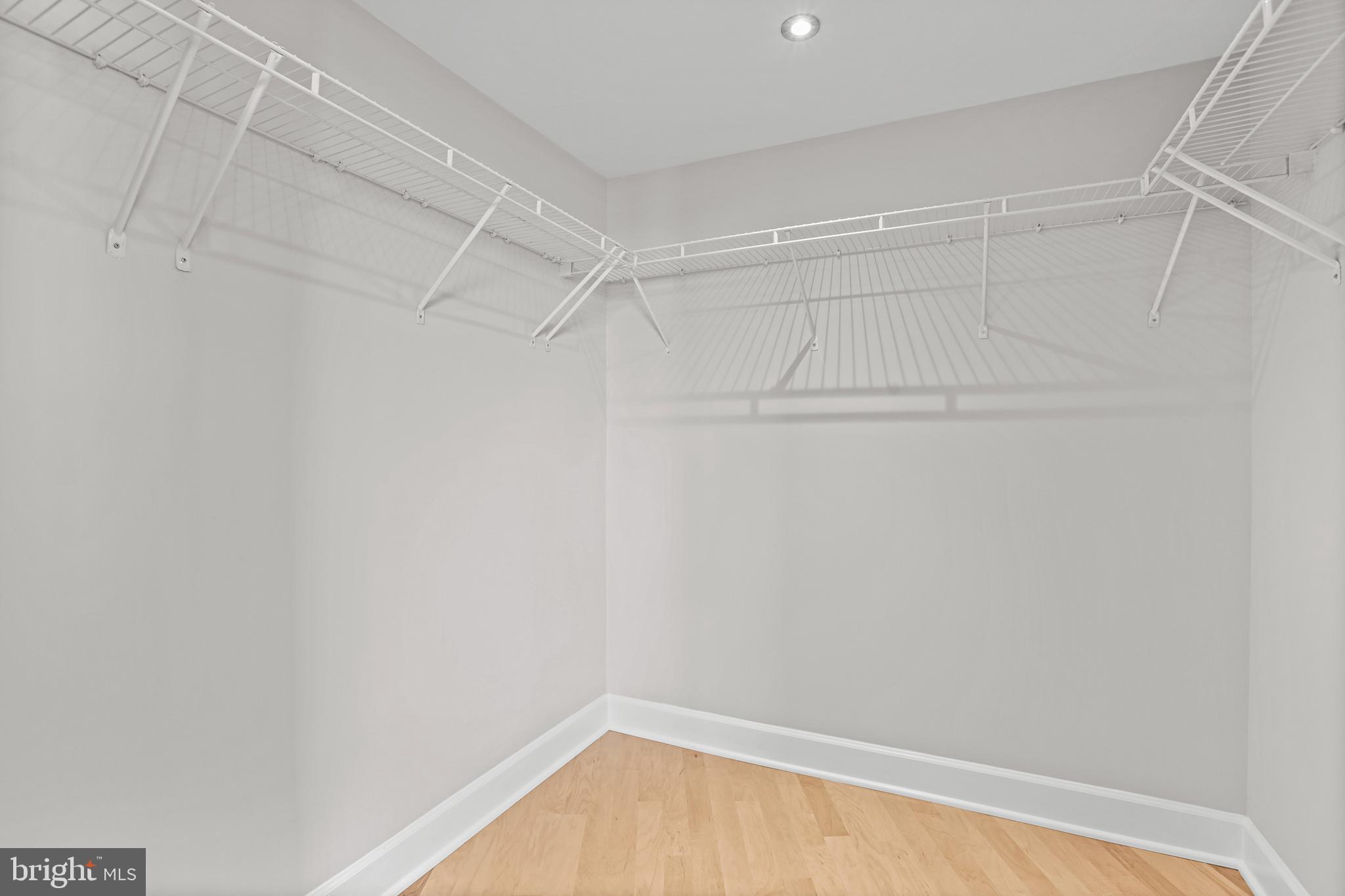 1220 North Fillmore Street, Unit 602 Arlington, VA 22201 - Photo 20 of 43 a view of an empty walk in closet
