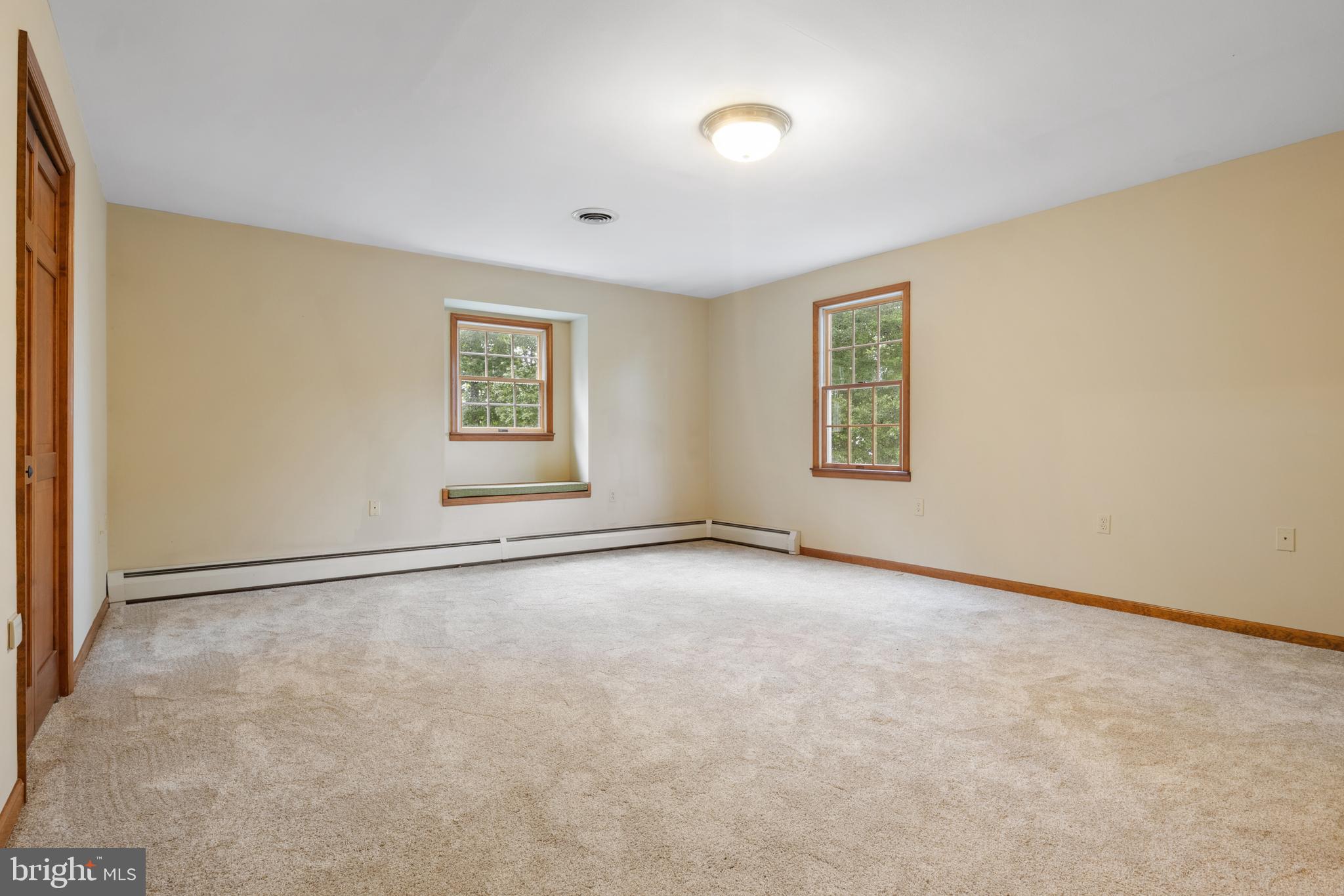4850 Delta Road Delta, PA 17314 - Photo 16 of 74 an empty room with windows and closet