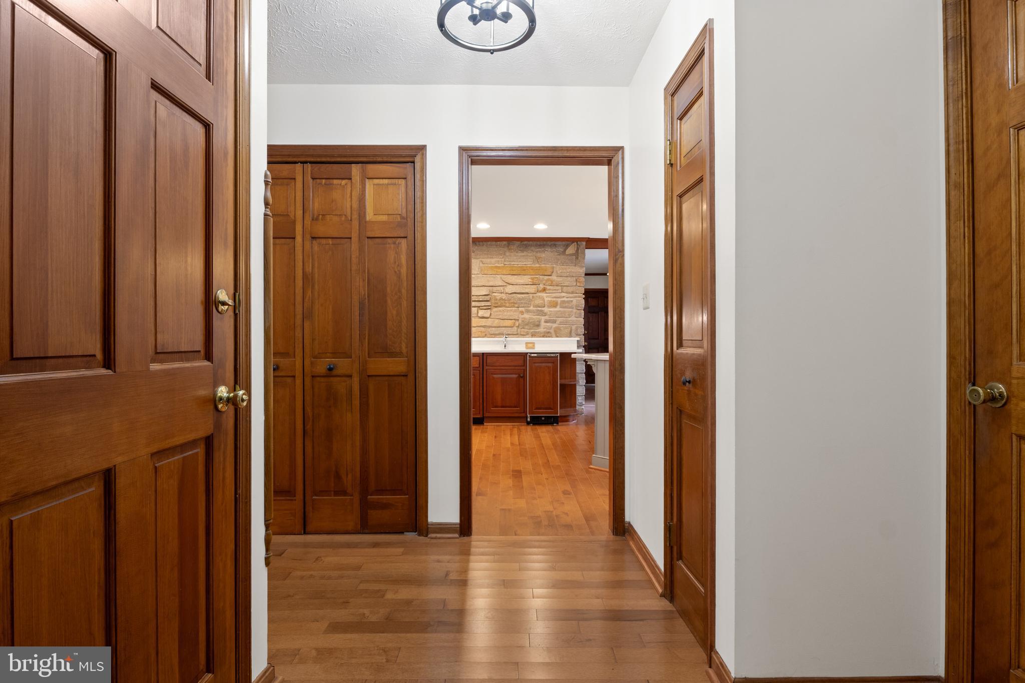 4850 Delta Road Delta, PA 17314 - Photo 25 of 74 a view of a hallway with wooden floor and closet