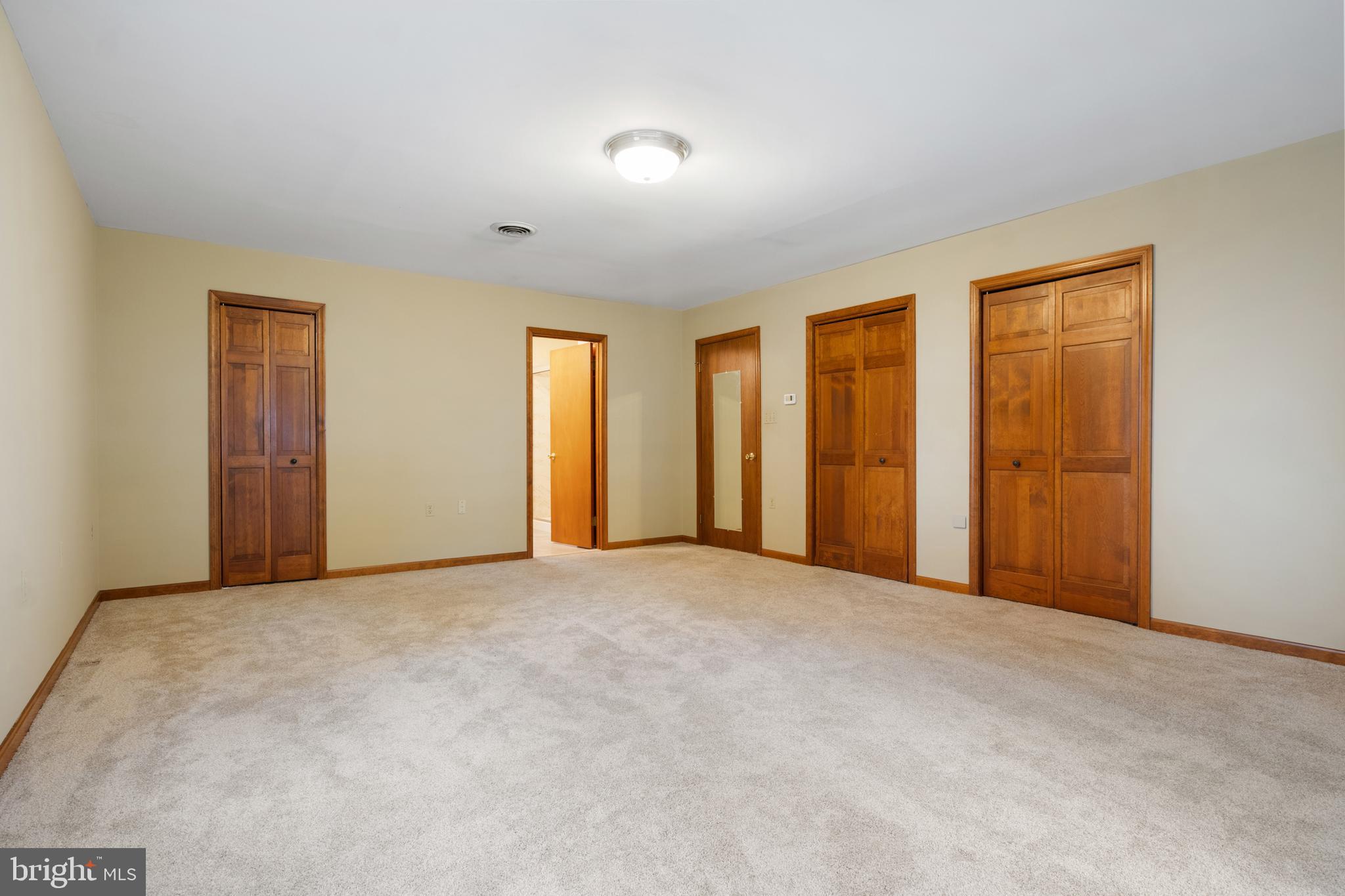 4850 Delta Road Delta, PA 17314 - Photo 42 of 74 an empty room with windows and closet