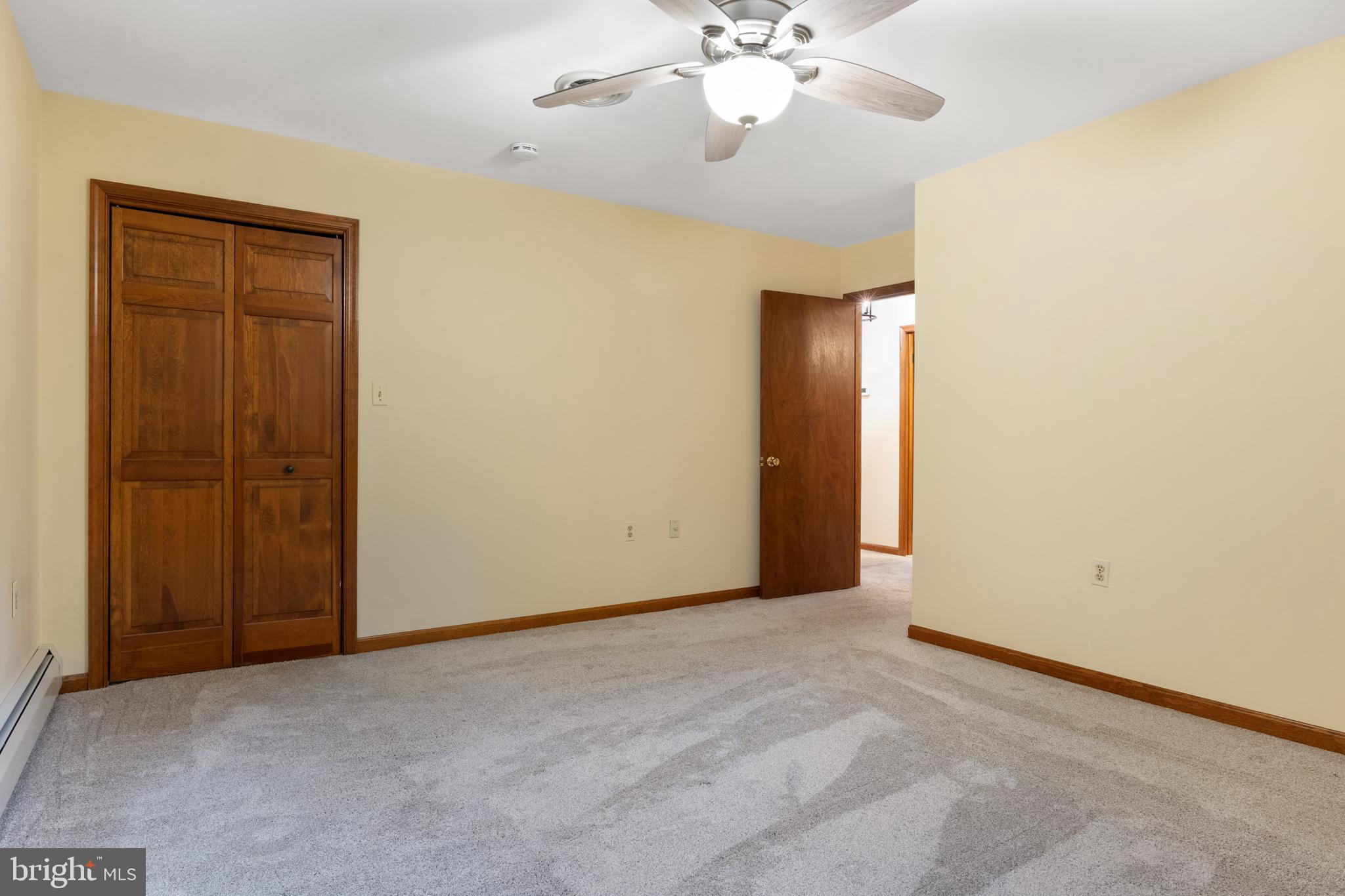 4850 Delta Road Delta, PA 17314 - Photo 45 of 74 an empty room with a chandelier fan