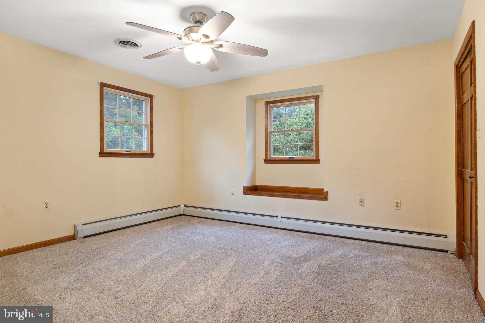 4850 Delta Road Delta, PA 17314 - Photo 47 of 74 an empty room with windows and fan