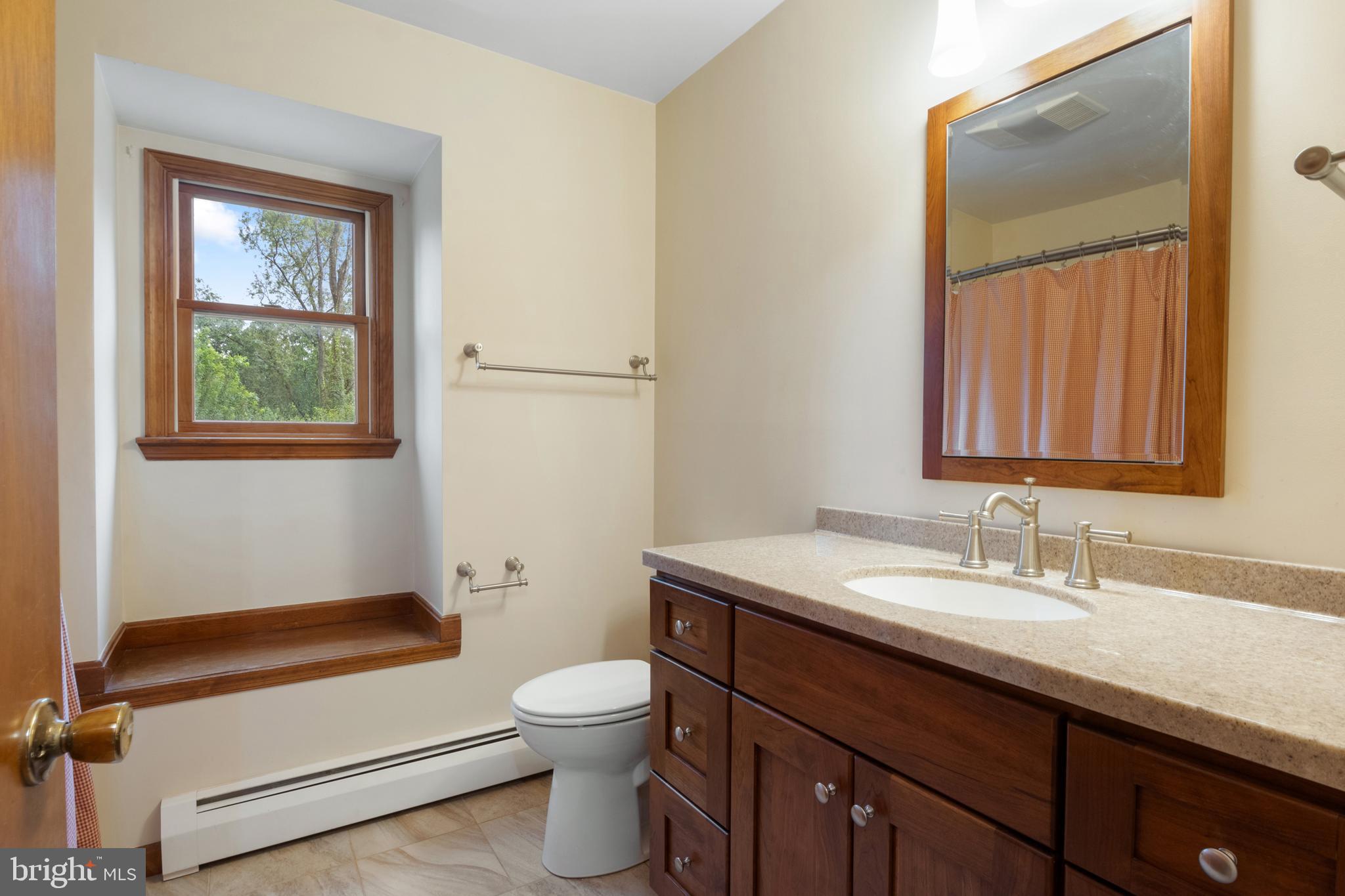 4850 Delta Road Delta, PA 17314 - Photo 48 of 74 a bathroom with a sink a toilet and shower