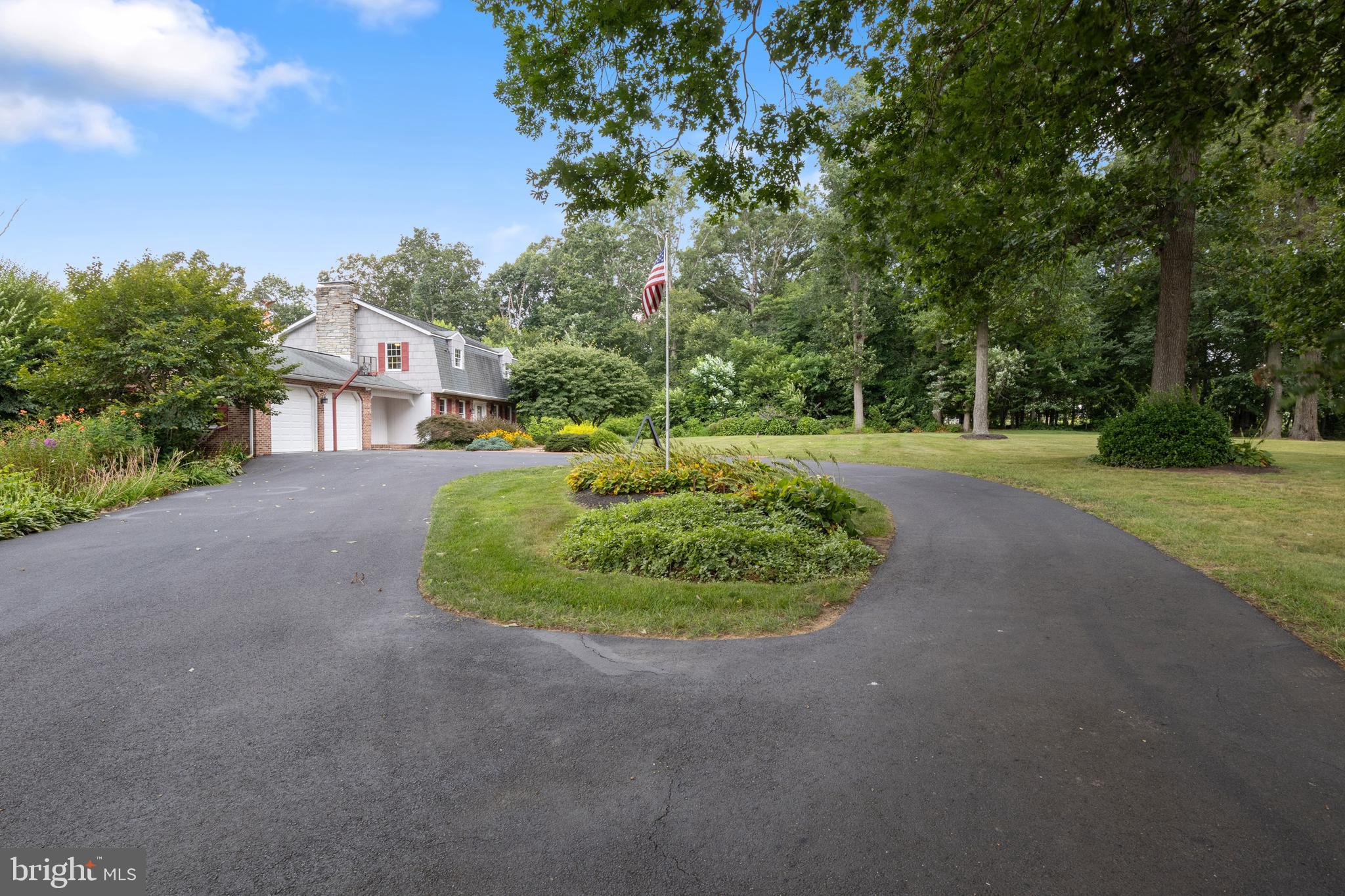 4850 Delta Road Delta, PA 17314 - Photo 7 of 74 a view of a big house with a big yard and large trees
