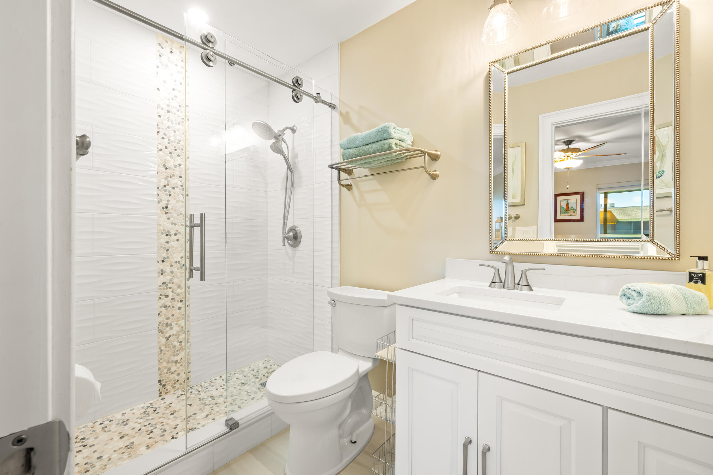 755 Saturn Street, Unit I208 Jupiter, FL 33477 - Photo 12 of 25 Primary Bathroom