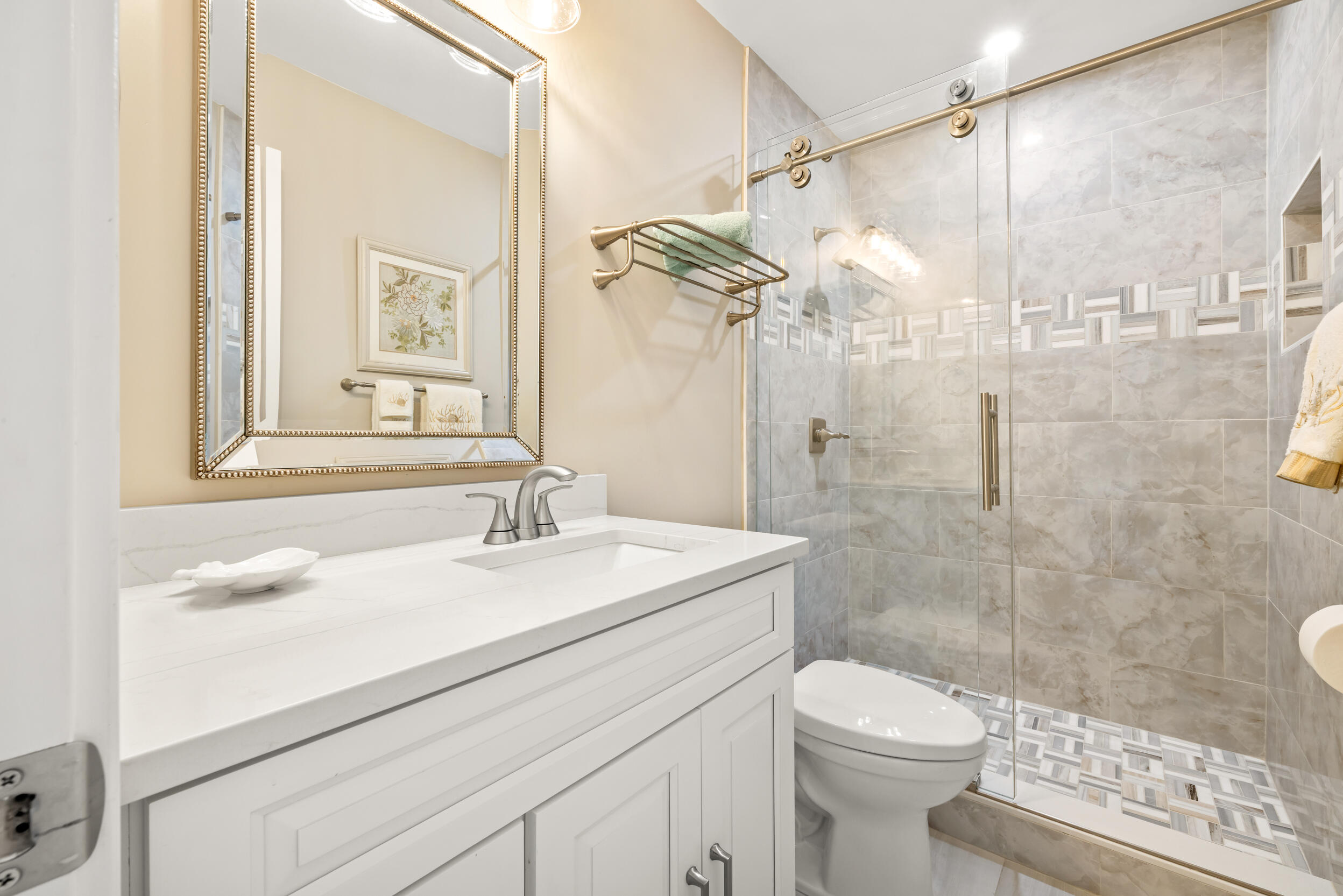 755 Saturn Street, Unit I208 Jupiter, FL 33477 - Photo 15 of 25 Guest Bathroom