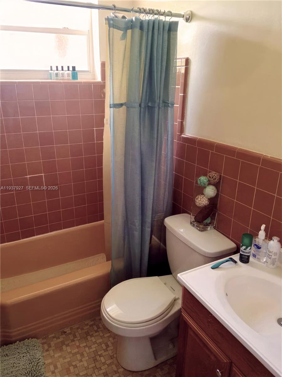 12501 Southwest 90th Avenue Miami, FL 33176 - Photo 17 of 27 a bathroom with a sink toilet and shower