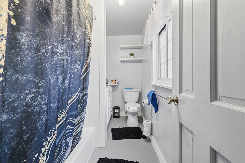 62 Main Street Saugus, MA 01906 - Photo 11 of 24 a bathroom with a sink toilet and shower