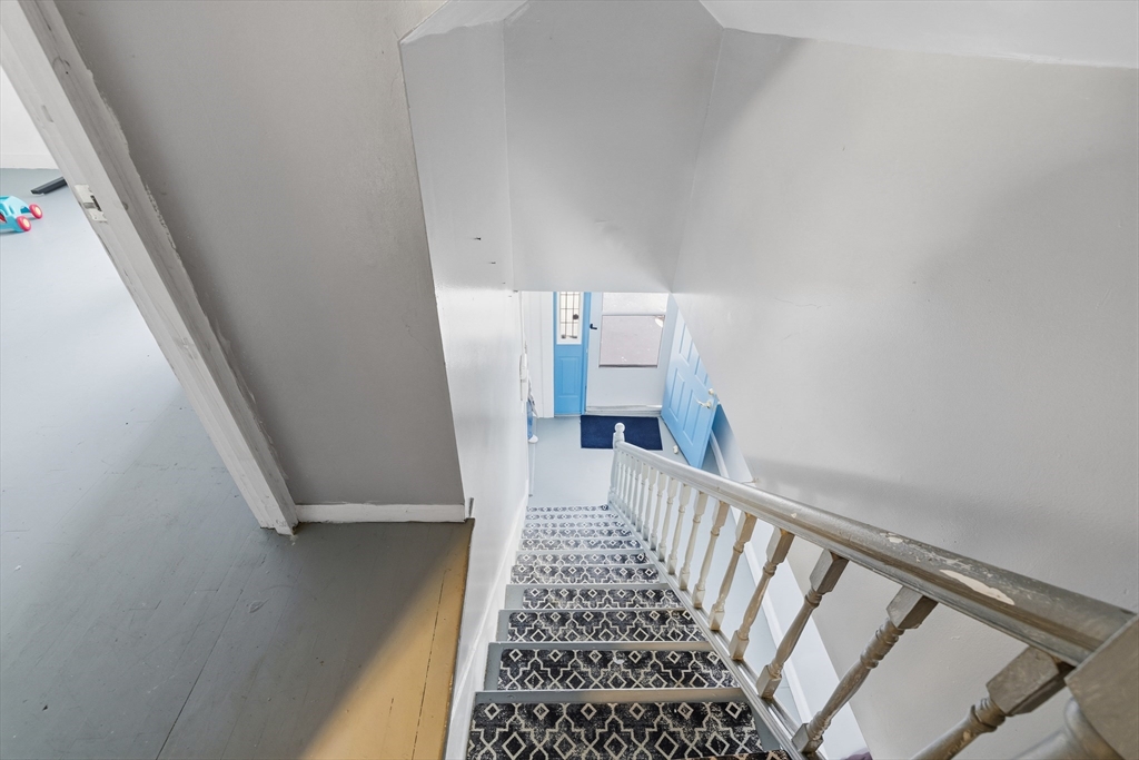 62 Main Street Saugus, MA 01906 - Photo 18 of 24 a view of a hallway view with staircase