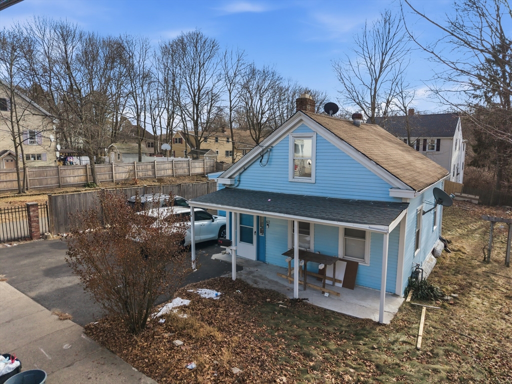 62 Main Street Saugus, MA 01906 - Photo 19 of 24 a view of a house with a yard