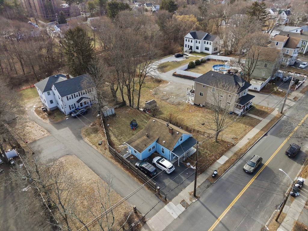 62 Main Street Saugus, MA 01906 - Photo 2 of 24 an aerial view of a house with outdoor space